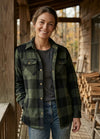 Front view of a woman wearing an army green women's quilted lined snap button shirt jacket-XR1178AG-S,XR1178AG-M,XR1178AG-L,XR1178AG-XL,XR1178AG-XXL