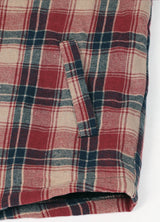 Close-up of the hand pocket of red and khaki men's plaid fleece lined flannel shirt jacket 
