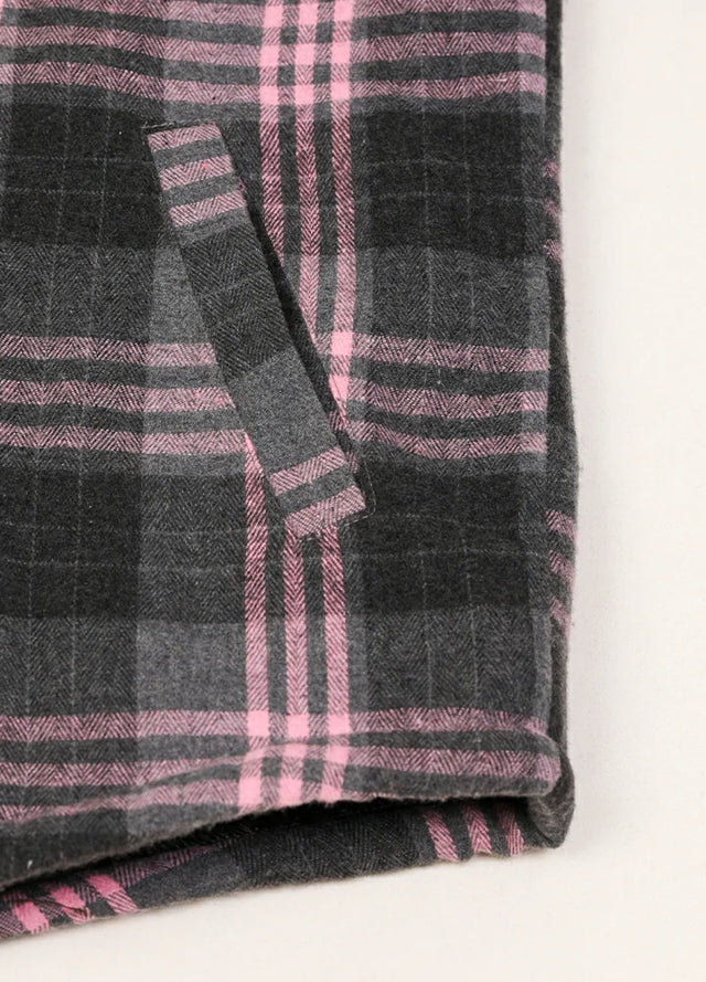 Detailed view of the hand pocket of the pink men's sherpa lined jacket with removable hood 