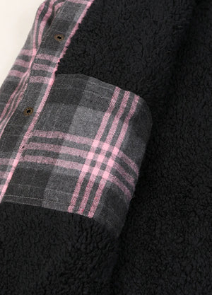 Close-up of the inner pocket of the pink men's sherpa lined jacket with removable hood 