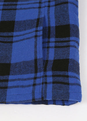 Close-up view of the hand pocket detail on the kid's full zip-up lambswool-lined jacket in Blue Black