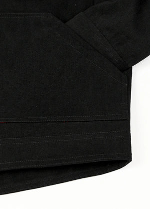 Close-up of the hand pocket of the black men's breezy casual flannel lined shirt jacket 