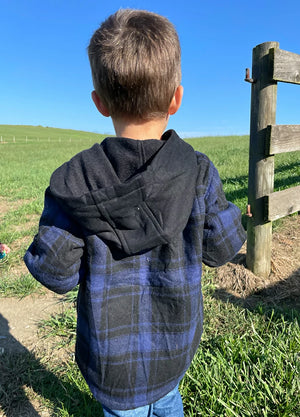 Lifestyle view of a child wearing navy beige kids boys and girls fleece-lined snap flannel shirt hooded plaid jacket-XR181NB-S,XR181NB-M,XR181NB-L,XR181NB-XL