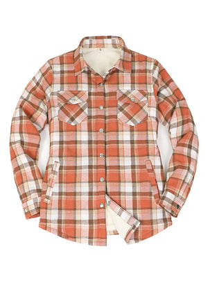 Front view of a women's snap sherpa lined rust red flannel jacket