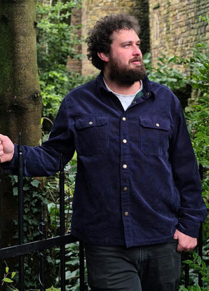 Lifestyle view of a man wearing navy men's corduroy flannel lined shirt jacket utility shacket-XR190NY-S,XR190NY-M,XR190NY-L,XR190NY-XL,XR190NY-XXL