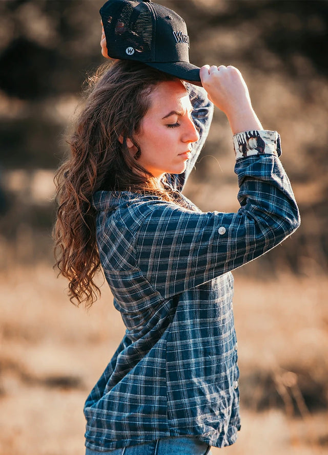 Side view of a woman wearing a womens printed soft navy blue plaid flannel shirt-XR198NY-S,XR198NY-M,XR198NY-L,XR198NY-XL,XR198NY-XXL