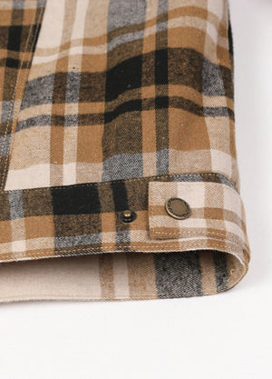 Detailed view of the hem of a beige latte men's outdoor fleece lined shirt jacket