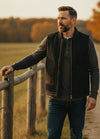 Front view of a man wearing a black arctic quilted lined canvas work vest-XR601BLK0M,XR601BLK0L,XR601BLK0XL,XR601BLK0XXL