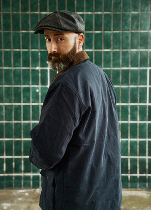 Lifestyle view of a man wearing navy men's heritage vintage field jacket-XR807NY-M,XR807NY-L,XR807NY-XL,XR807NY-XXL