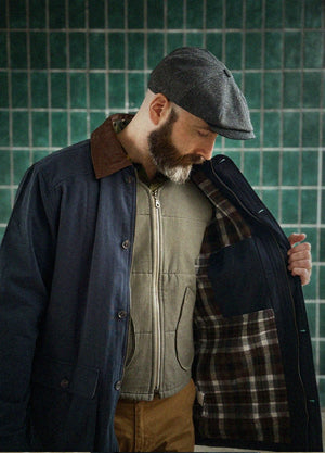 Lifestyle view of a man wearing navy men's heritage vintage field jacket-XR807NY-M,XR807NY-L,XR807NY-XL,XR807NY-XXL