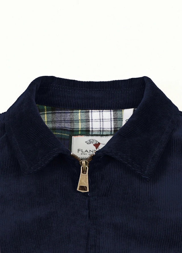 Close-up of the lapel of navy men's soft vintage corduroy jacket