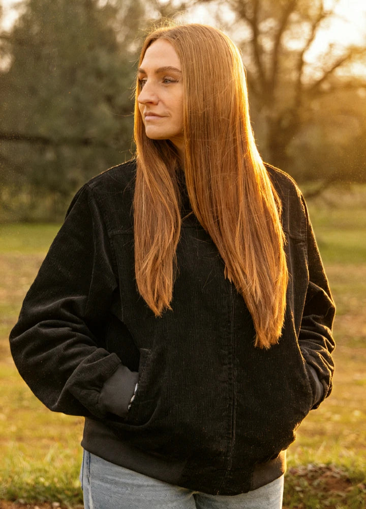 Lifestyle view of a woman wearing black women's vintage corduroy jacket-XR811BK-S,XR811BK-M,XR811BK-L,XR811BK-XL