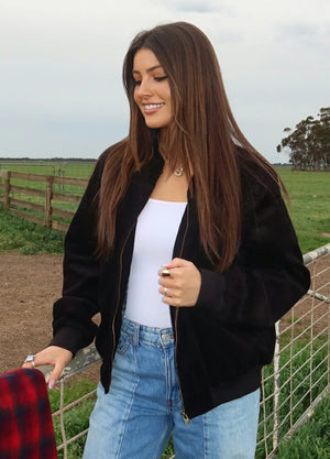 Lifestyle view of a woman wearing black women's vintage corduroy jacket-XR811BK-S,XR811BK-M,XR811BK-L,XR811BK-XL