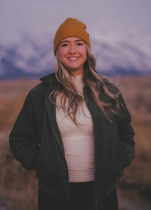 Lifestyle view of a woman wearing moss women's vintage corduroy jacket-XR811MS-S,XR811MS-M,XR811MS-L,XR811MS-XL