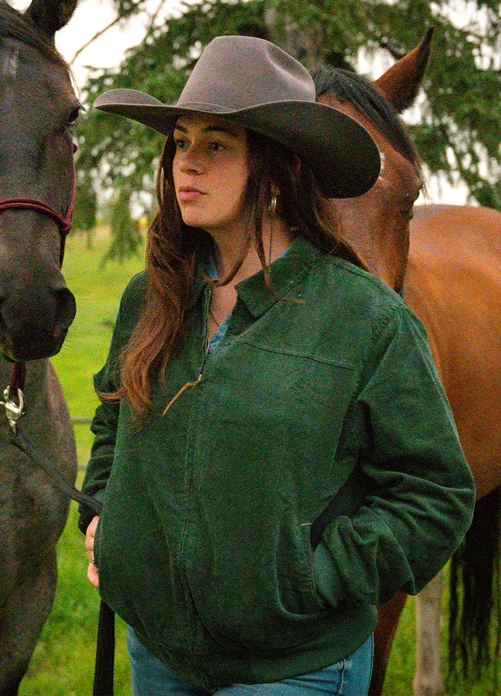 Lifestyle view of a woman wearing moss women's vintage corduroy jacket-XR811MS-S,XR811MS-M,XR811MS-L,XR811MS-XL
