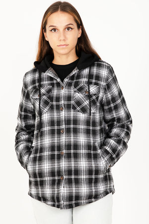 Women in a gray and black button up flannel shirt jacket with hood