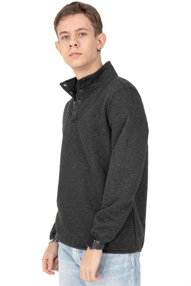 Side view of boy in charcoal heather mountain outdoor shirt